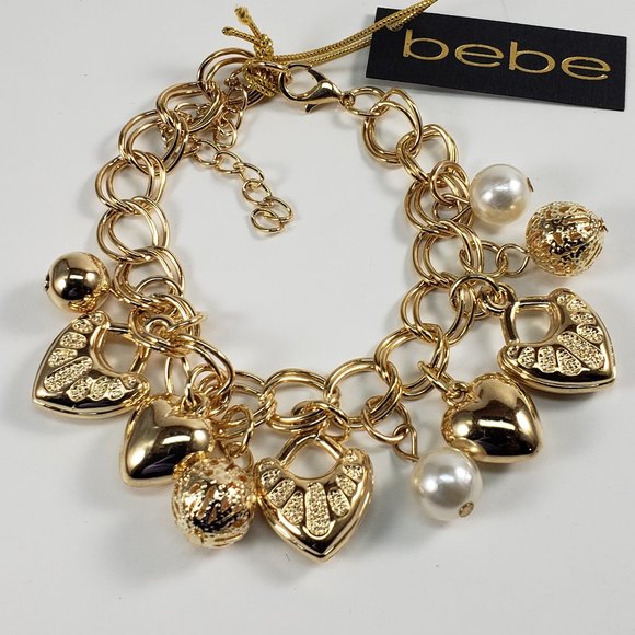 bebe Jewelry - Polished Gold-tone Bracelet with Beads & Heart Charms